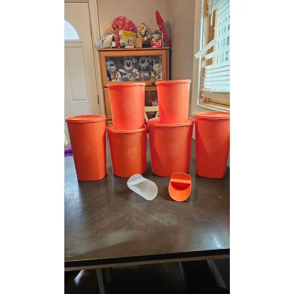 14 piece vintage orange Tupperware canisters- 6 complete‎ and 2 scoops
